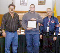The Potawatomi Trails Pow-Wow Committee presented a Certificate of Honor to committee member C. J. Long for his actions to alert and evacuate people from a burning apartment complex. Pictured left to right Bill Brown committee chairman, C. J. Long, and Tom Long.
